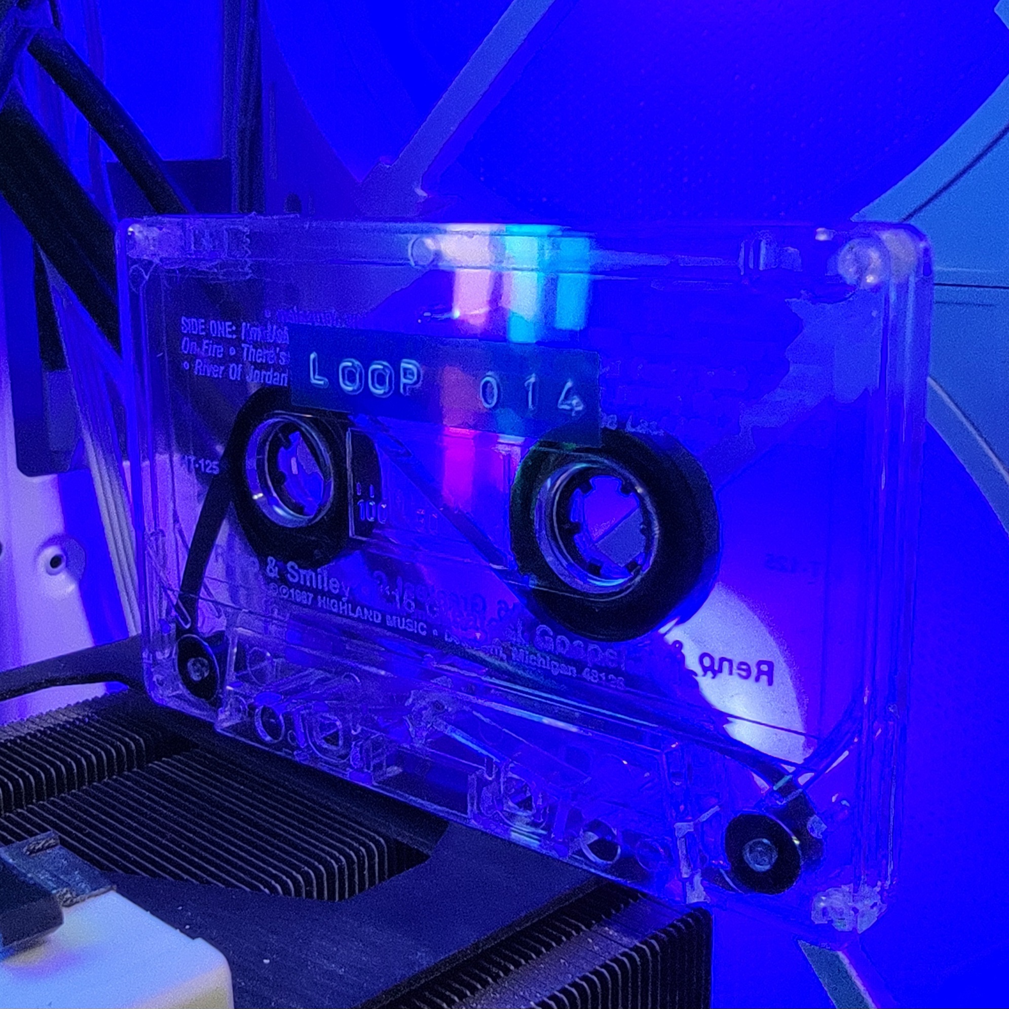 Green cassette with loop