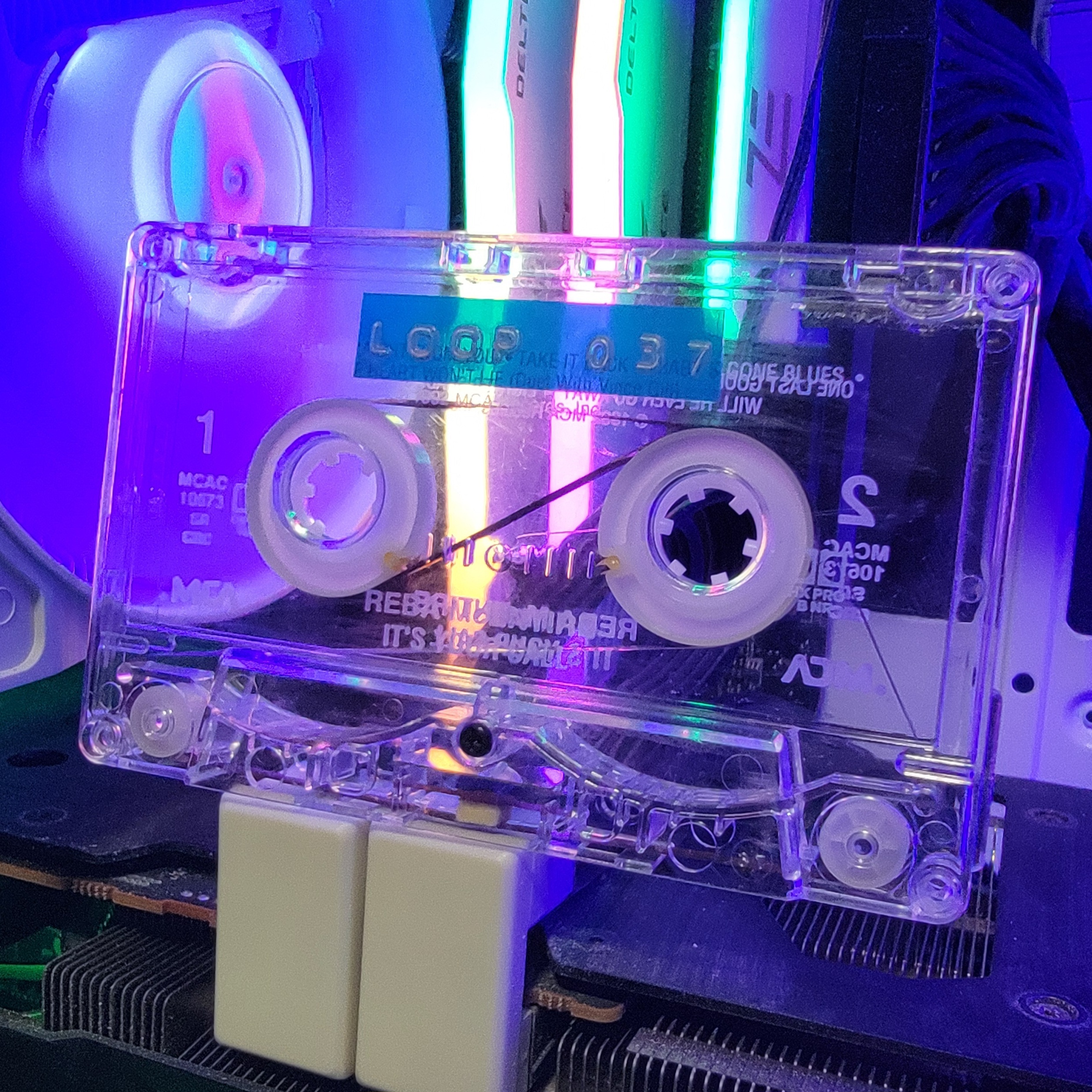 Clear cassette with green glow and RAM sticks
