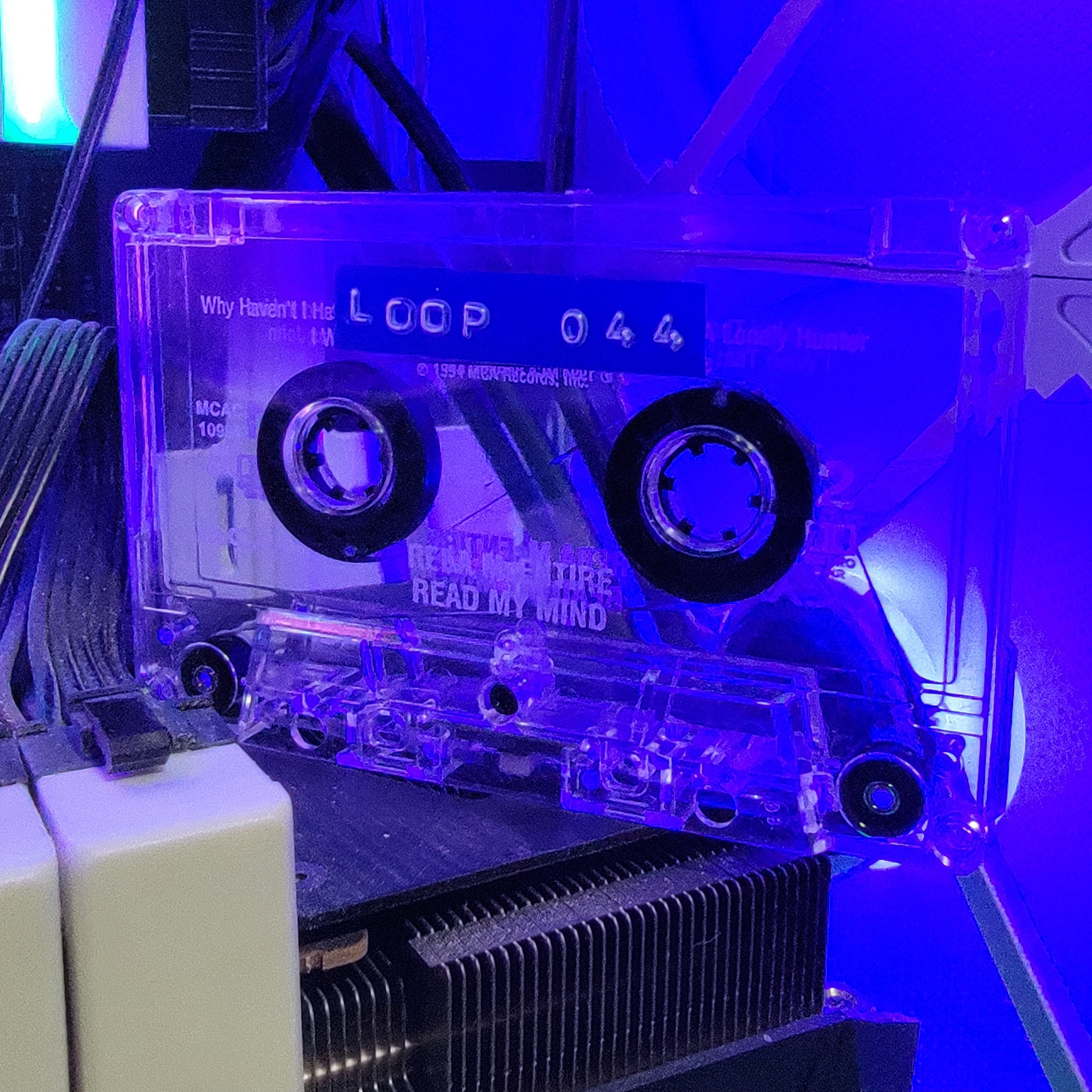 Clear cassette reflecting rainbow light